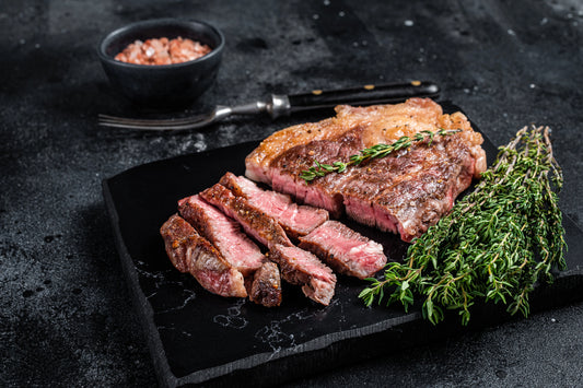 Grilled Chuck Eye Steak sliced medium rare from Diamond B Ranch