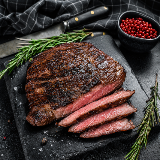 Grilled Flat Iron Steak sliced medium rare from Diamond B Ranch