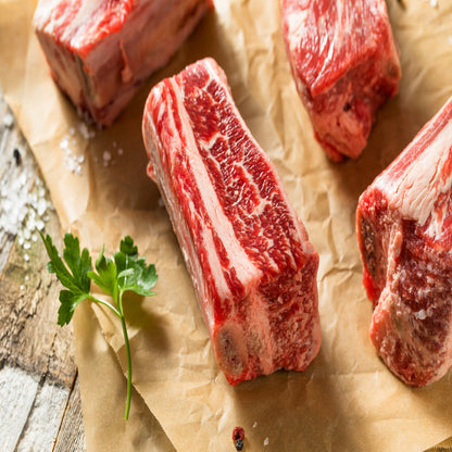 Raw dry aged Angus Short Ribs from Diamond B Ranch