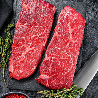 Raw pasture-raised Angus Denver steaks from Diamond B Ranch